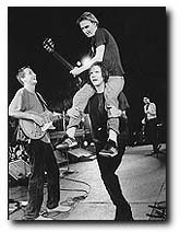 [the guys onstage;  Charles Peterson]