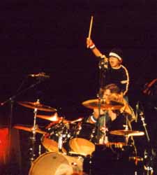 Jesse raises the drum stick